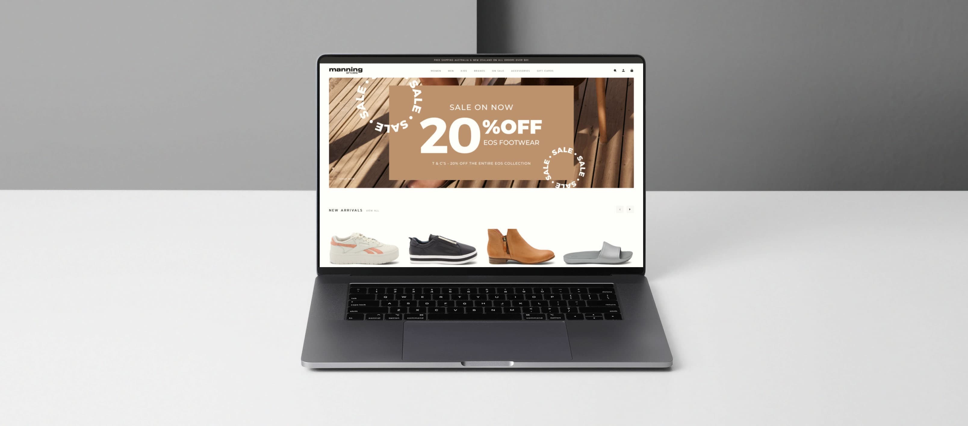 Manning Shoes screen print on laptop